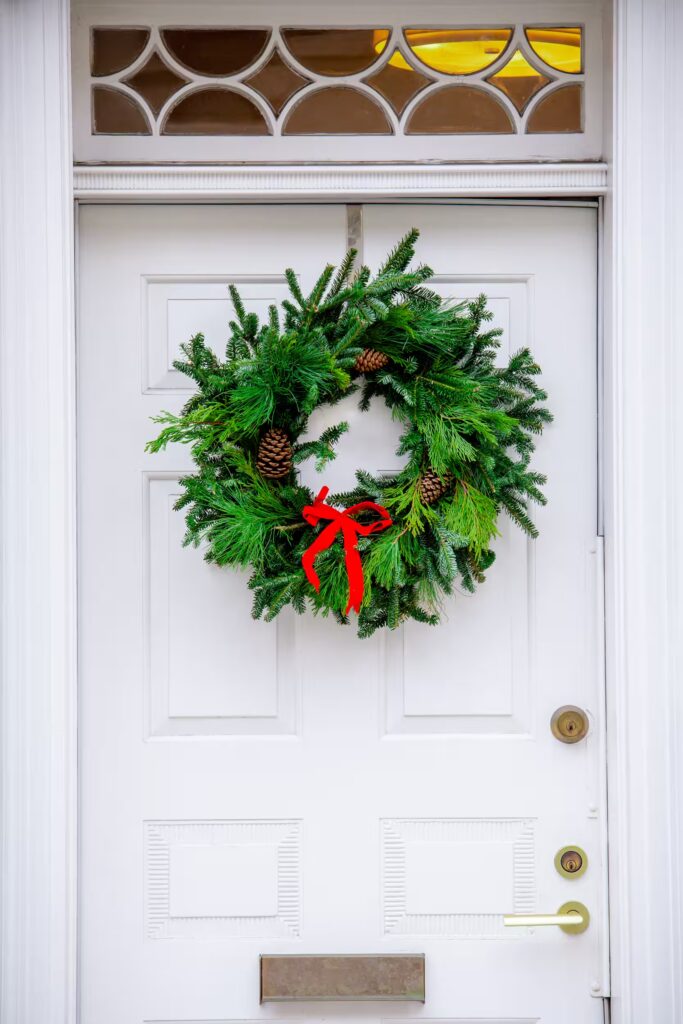 The holidays are the perfect time to add warmth and cheer to your home’s exterior. But before you hang that wreath or wrap your garland, it’s important to make sure your décor won’t harm your door’s finish. These tips will help you create a festive look, without leaving a mark.